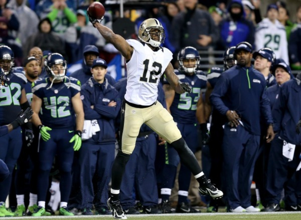 Marques Colston's illegal forward pass ended the Saints' comeback hopes. (Jeff Gross/Getty Images)