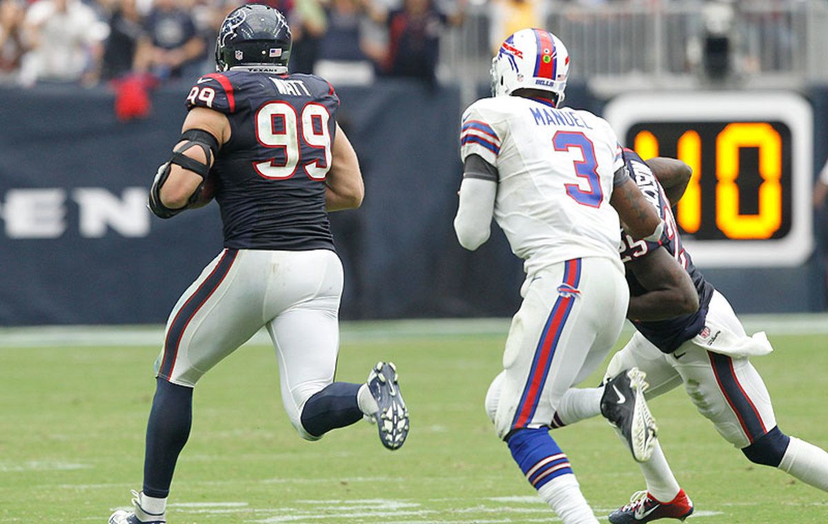 J.J. Watt had an interception return for a touchdown as the Texans improved to 3-1 with a win over the Bills on Sunday. (Bob Levey/Getty Images)