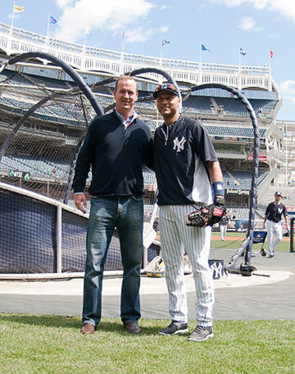 Peyton Manning visited Jeter at Yankee Stadium in May. (Tomasso DeRosa/AP)