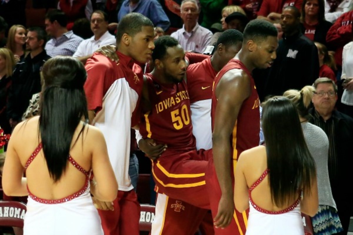 DeAndre Kane grabbed his left ankle after missing a layup on a drive to the basket. (Alonzo Adams/AP Images)