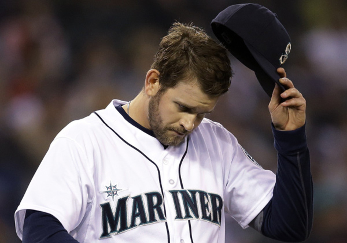 The Mariners can ill afford losing another starting pitcher to injury. (Elaine Thompson/AP)