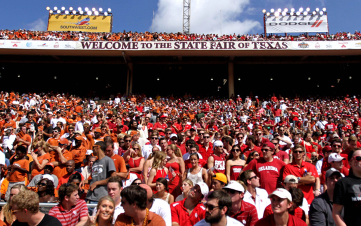 Oklahoma and Texas fans exchange pleasanteries during last year's game(AP Photo/The Daily Texan, Chelsea Purgahn)