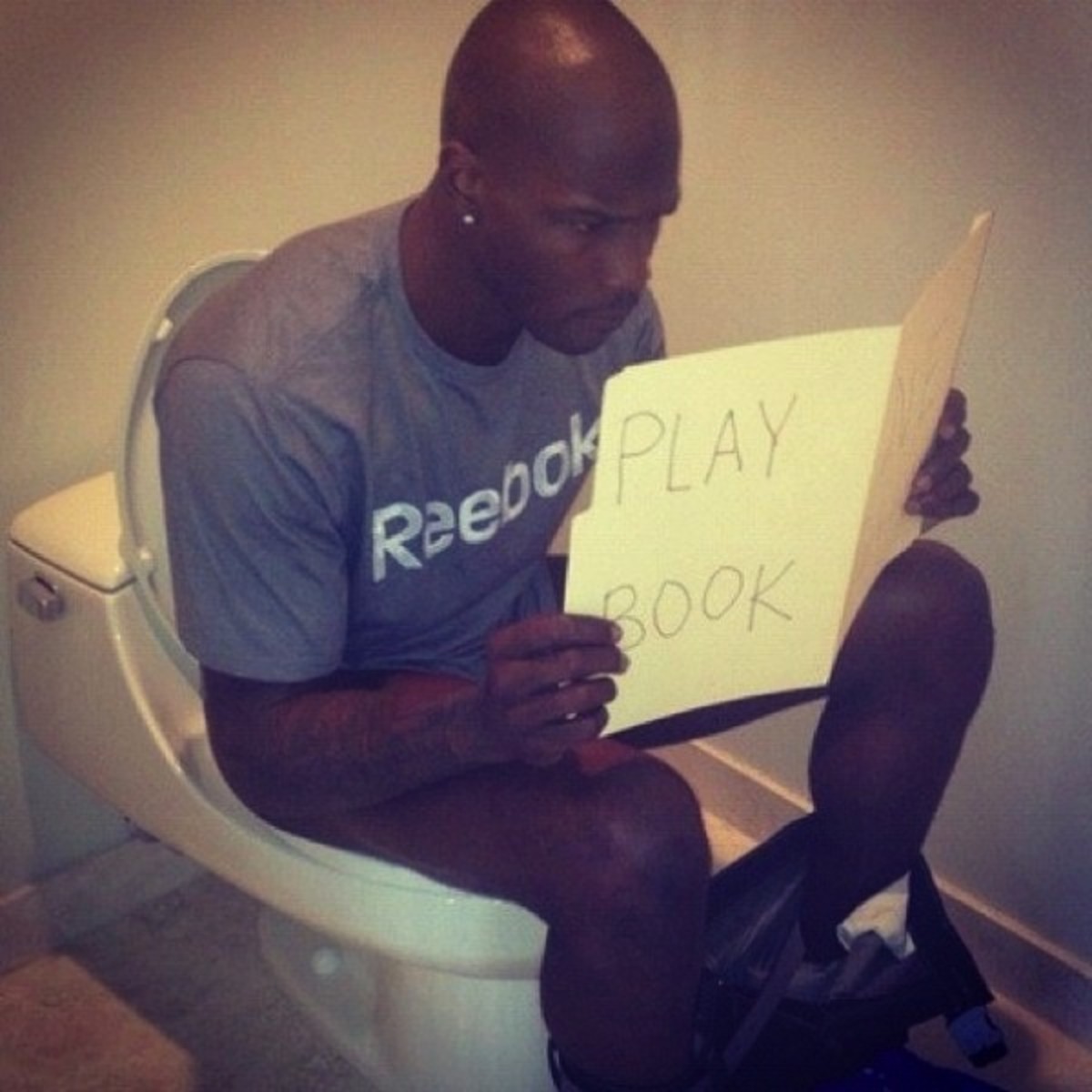 Chad Johnson on the toilet