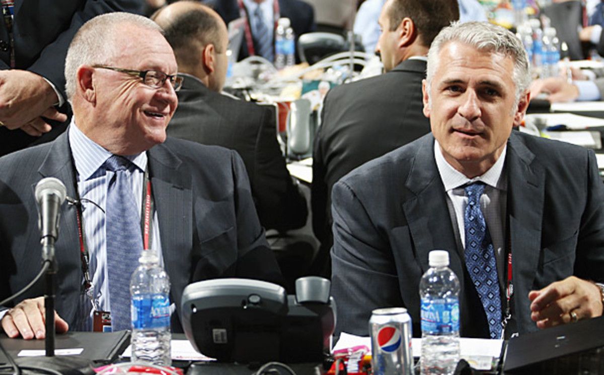 There were no hard feelings as Jim Rutherford (left) handed the Hurricanes' GM reins to Ron Francis.