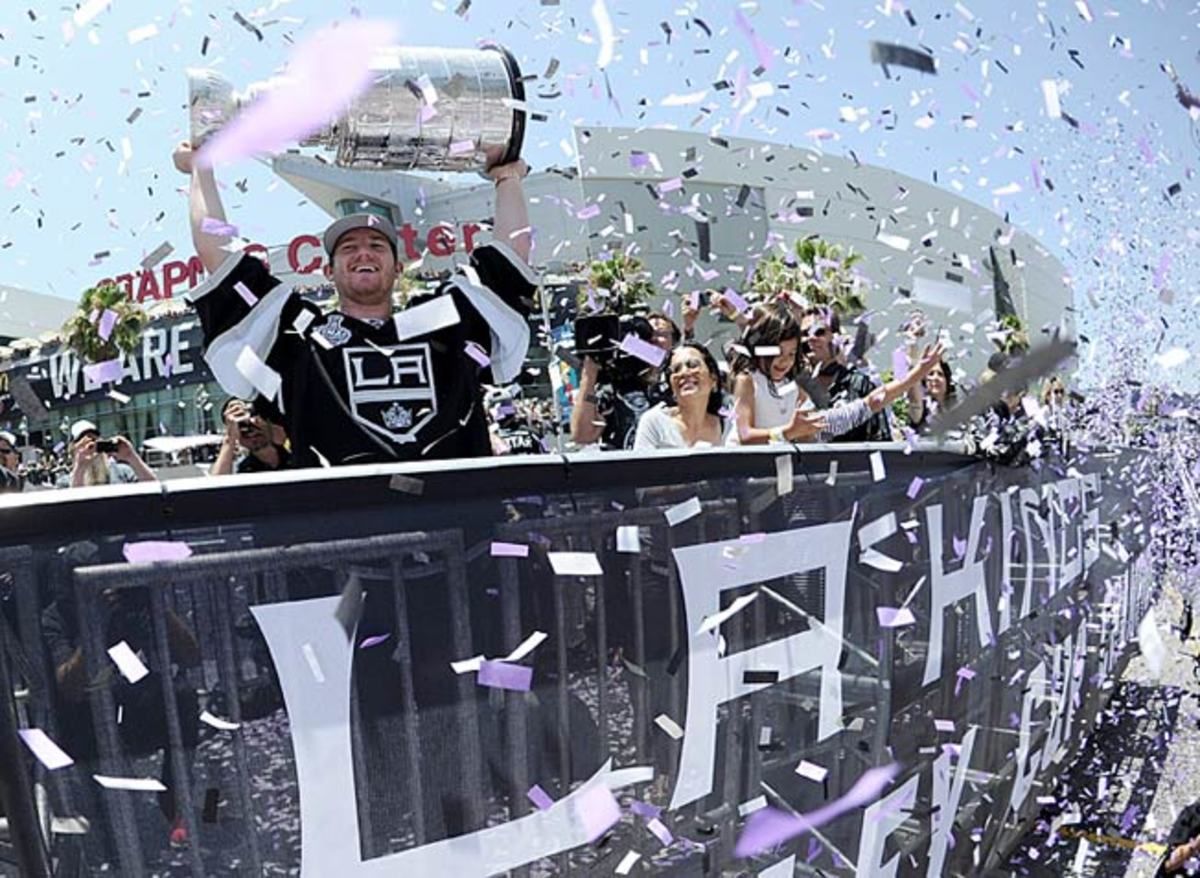 Goalie Jonathan Quick holds the silverware aloft as the Kings of the NHL reign for the second time.