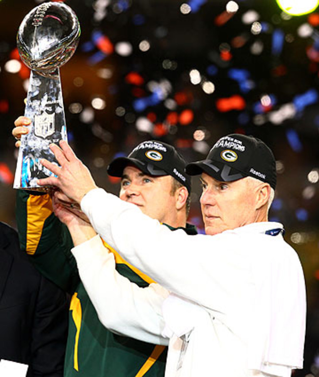 Thompson and Mike McCarthy lifted the Lombardi following the 2010 season. (Kevin Terrell/AP)