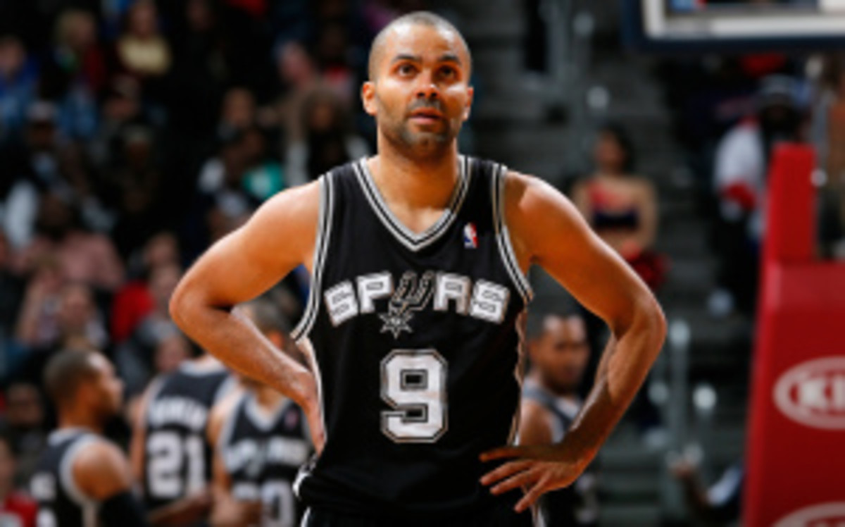 Tony Parker played just 19 minutes before leaving with back tightness in Wednesday's double-overtime win in Washington. (Kevin C. Cox/Getty Images)