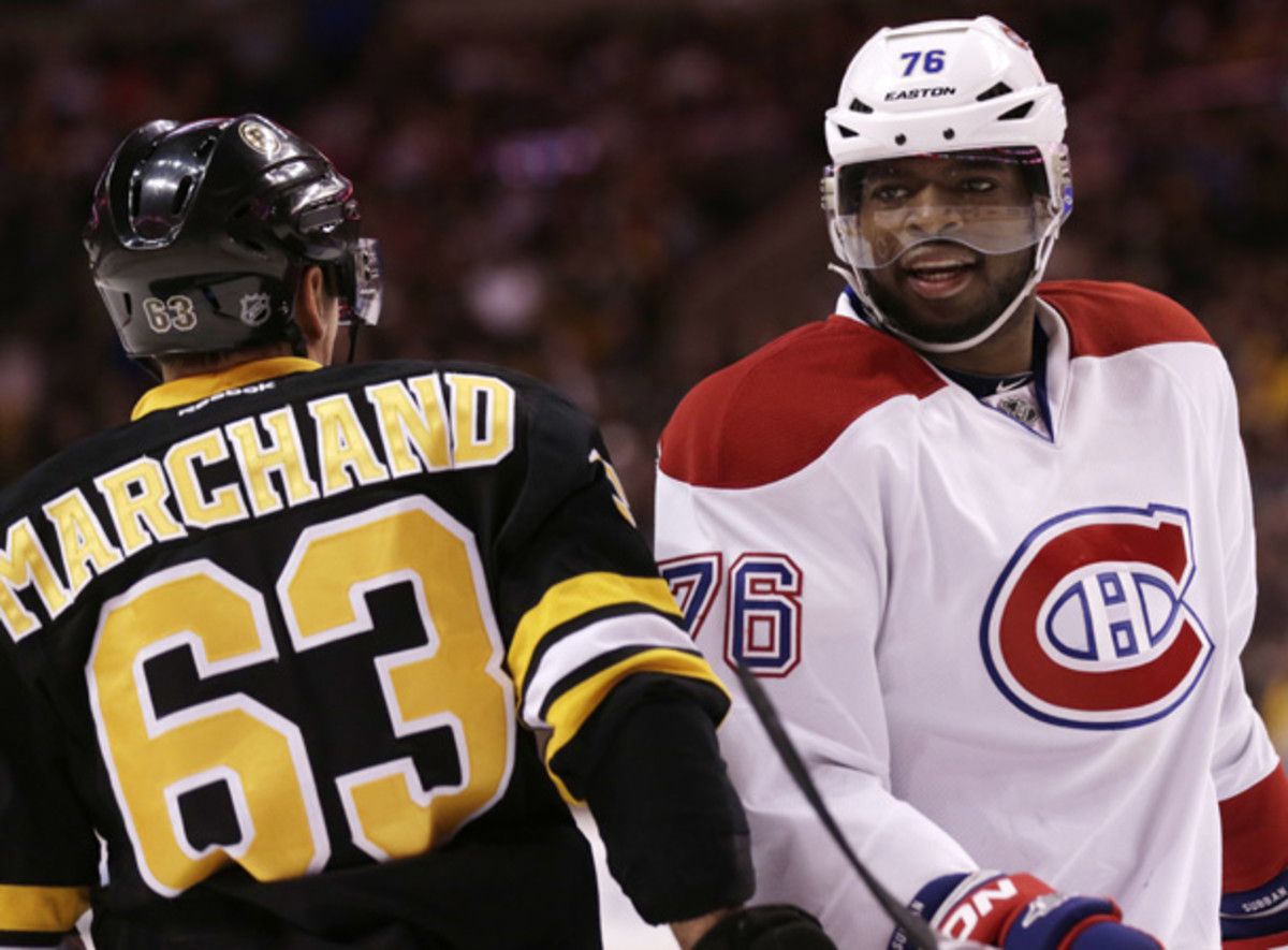 Brad Marchand and P.K. Subban jaw during another feisty game between Boston and Montreal. (Charles Krupa/AP)