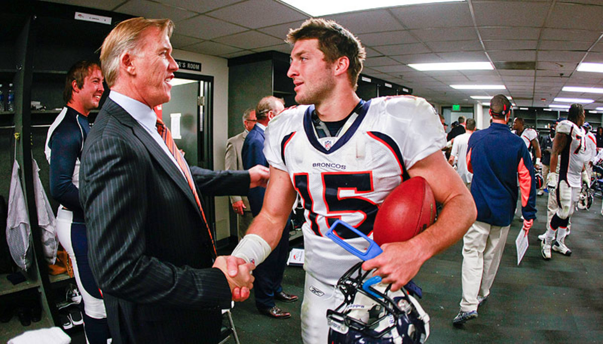 Tim Tebow went 7-4 as a starting quarterback in 2011, and led the Broncos to a win a playoff game, but was traded by Elway in the offseason. (Eric Bakke/AP)