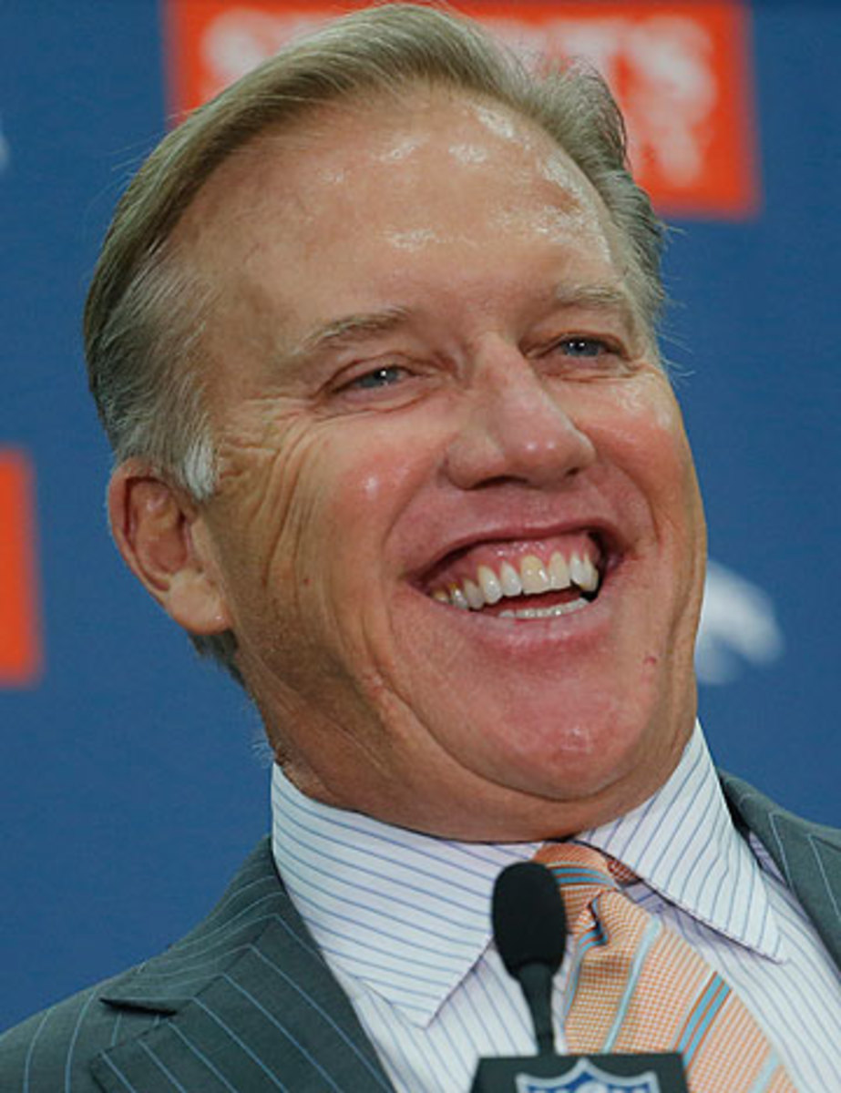 Elway plans for the smiles—and the winning—to continue even after his 38-year-old QB hangs 'em up. (Ed Andrieski/AP)