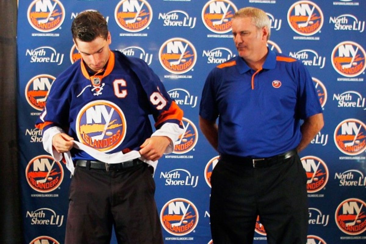 Garth Snow (right) and the Islanders named John Tavares captain last September. (Andy Marlin/Getty Images)