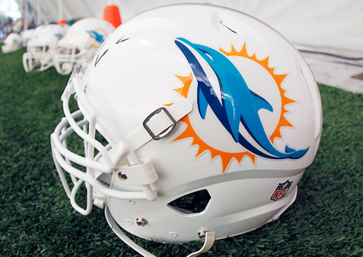 Ex-Miami Dolphins' scout says he was wrongfully terminated, threatening lawsuit