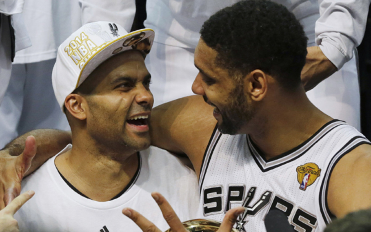 Spurs stars Tony Parker and Tim Duncan celebrate another NBA championship. (AP Photo/David J. Phillip)