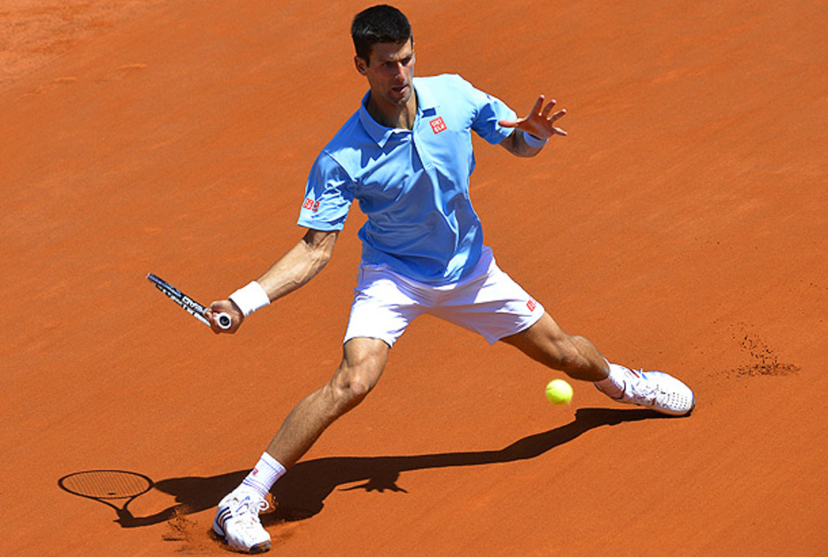 Novak Djokovic fends off Ernests Gulbis to advance to the French Open final...