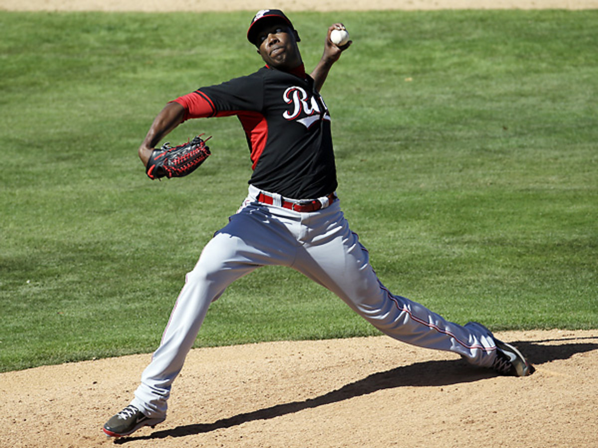 Aroldis Chapman was carted off of the field after he was struck in the head by a line drive. (Morry Gash/AP)