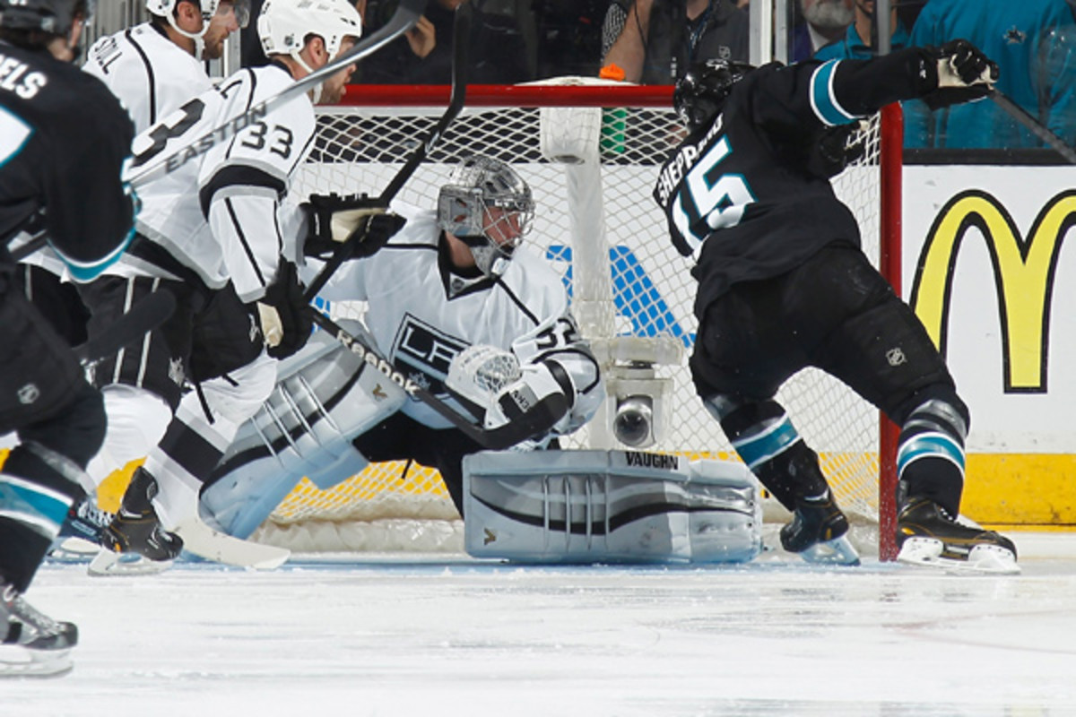 The Sharks' relentless forecheck did not make it an easy night for Jonathan Quick. (Nick Lust/NHLI via Getty Images)