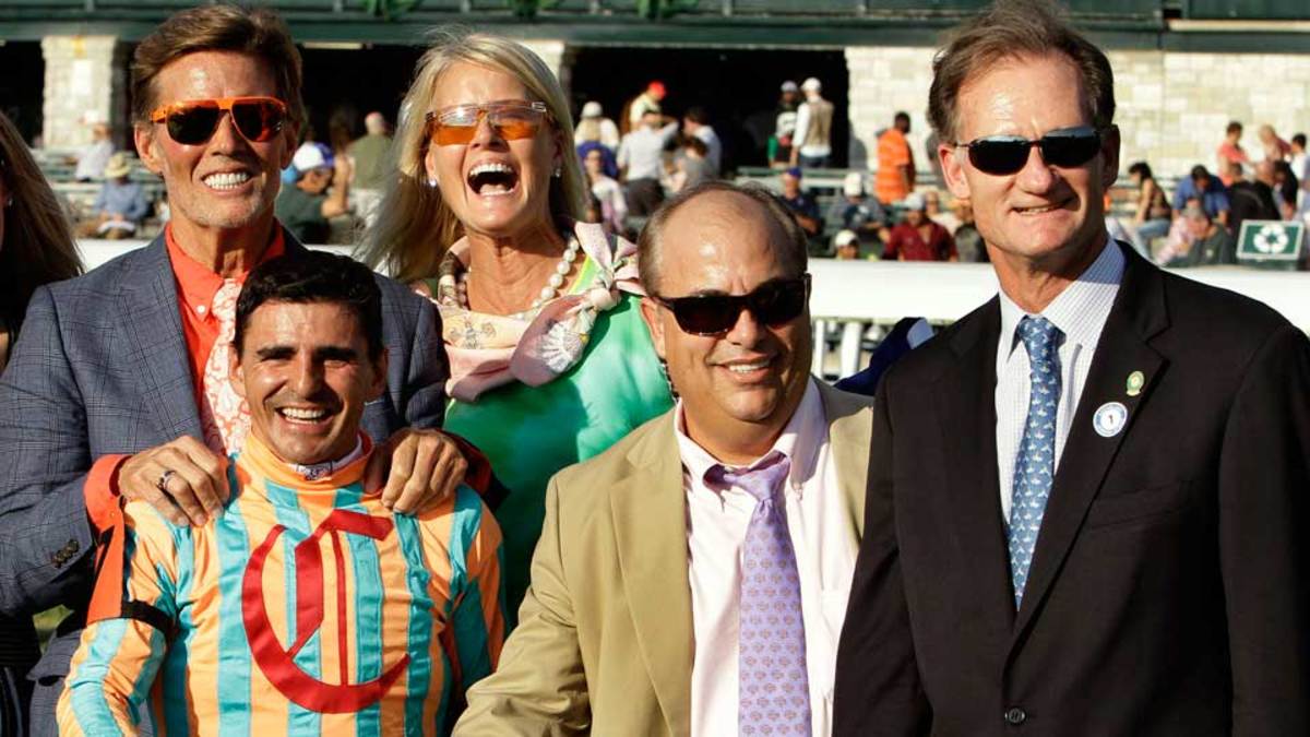 Ernie Semersky (above, far left) celebrates My Conquestadory's win in last October's Alcibiades Stakes at Keeneland with (clockwise from back center) co-owner Dory Newell, Jimmy Bell, of race sponsor Darley, trainer Mark Casse and jockey Eurico Da Silva.