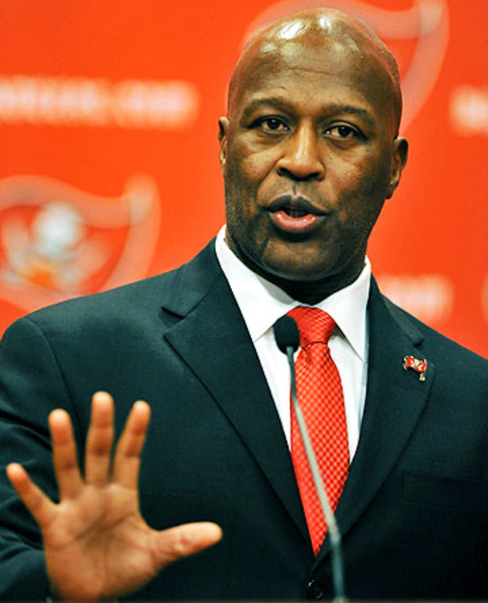 New Bucs coach Lovie Smith still was being paid by the Bears in 2013, even though the team fired him after the 2012 season. (Al Messerschmidt/Getty Images)