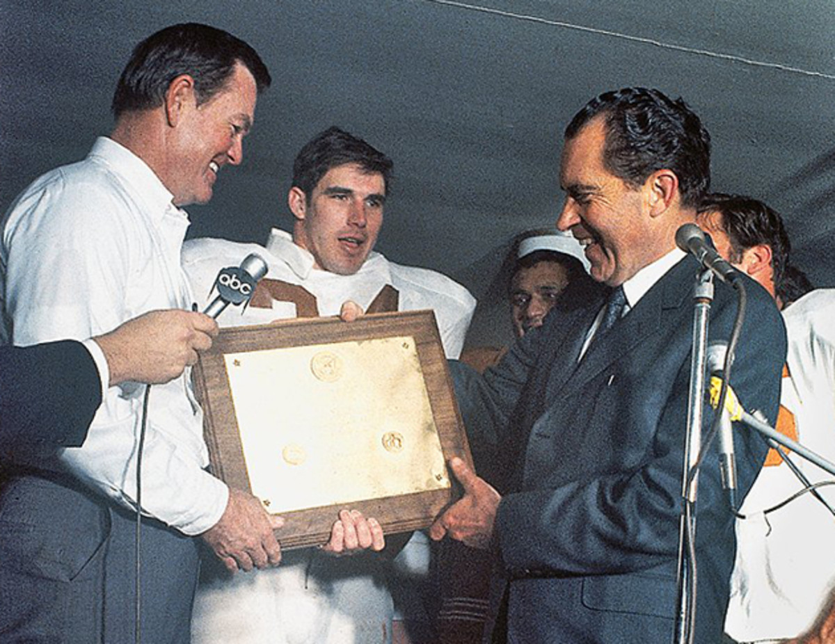 President Richard Nixon (right) presents Texas coach Darrell Royal (left) with plaque.