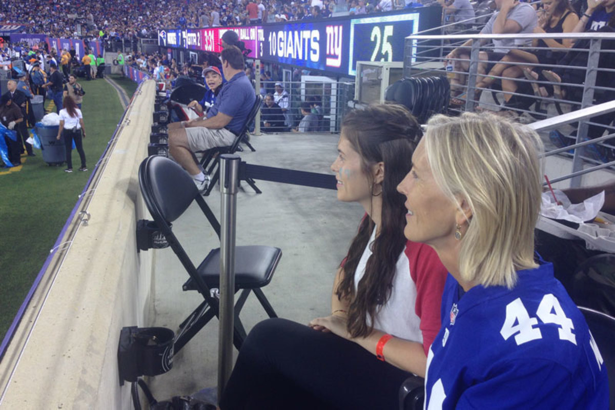 Soon-to-be wife KOMING and her mom had a front-row perch to watch Williams on Thursday. (Jenny Vrentas/The MMQB)