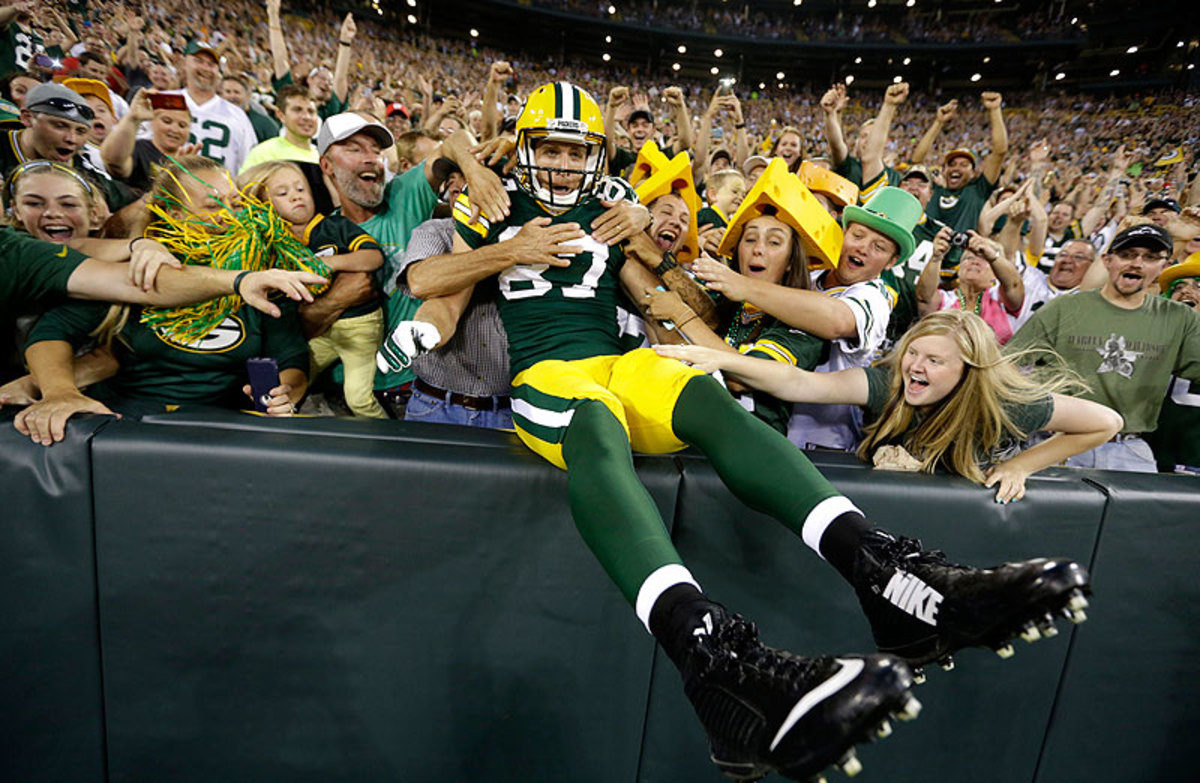 Packers wideout Jordy Nelson got the Lambeau Leap treatment after scoring a touchdown against the Raiders on Friday night. (Morry Gash/AP)