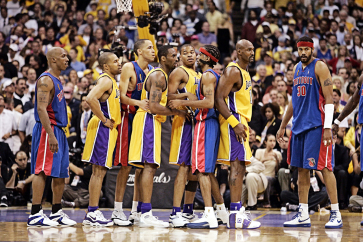 Chauncey Billups, Tayshaun Prince, Richard Hamilton and Rasheed Wallace battle for position with Derek Fisher, Kobe Bryant, Devean George, and Karl Malone during the 2004 NBA Finals. (John W. McDonough/SI)