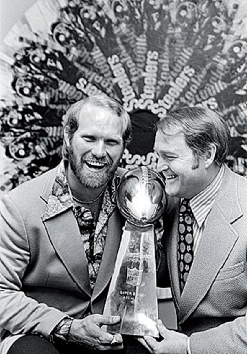 Terry Bradshaw and Chuck Noll with the Lombardi Trophy following a victory parade through downtown Pittsburgh in January 1975. (AP)