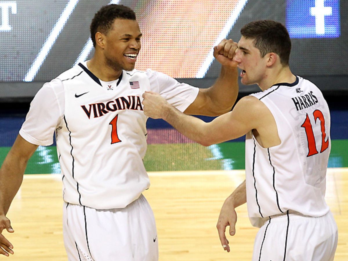 Justin Anderson (left) and Joe Harris had plenty to celebrate in Virginia's impressive win over Duke. (Tyler Lecka/Getty Images)