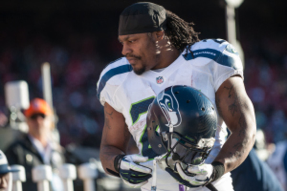 Marshawn Lynch finished Seattle’s Super Bowl season this year with 1,257 yards — his third consecutive 1,000-yard season and second highest season total. (Rob Tringali/Getty Images)