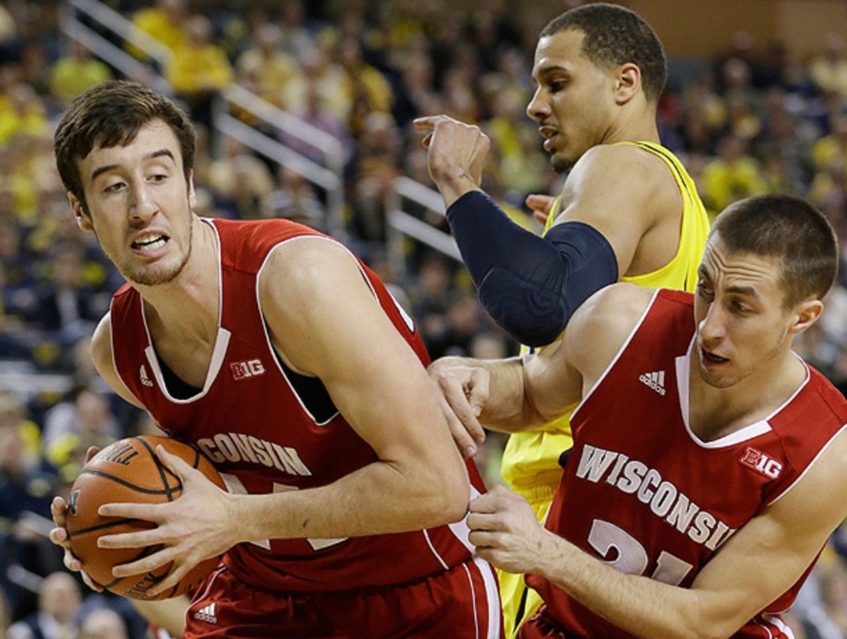 Frank Kaminsky (left) was a major force behind Wisconsin's win against Michigan. (Carlos Osorio/AP)