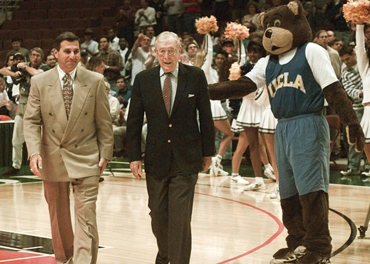 Wooden with then-UCLA coach Jim Harrick in 1995.