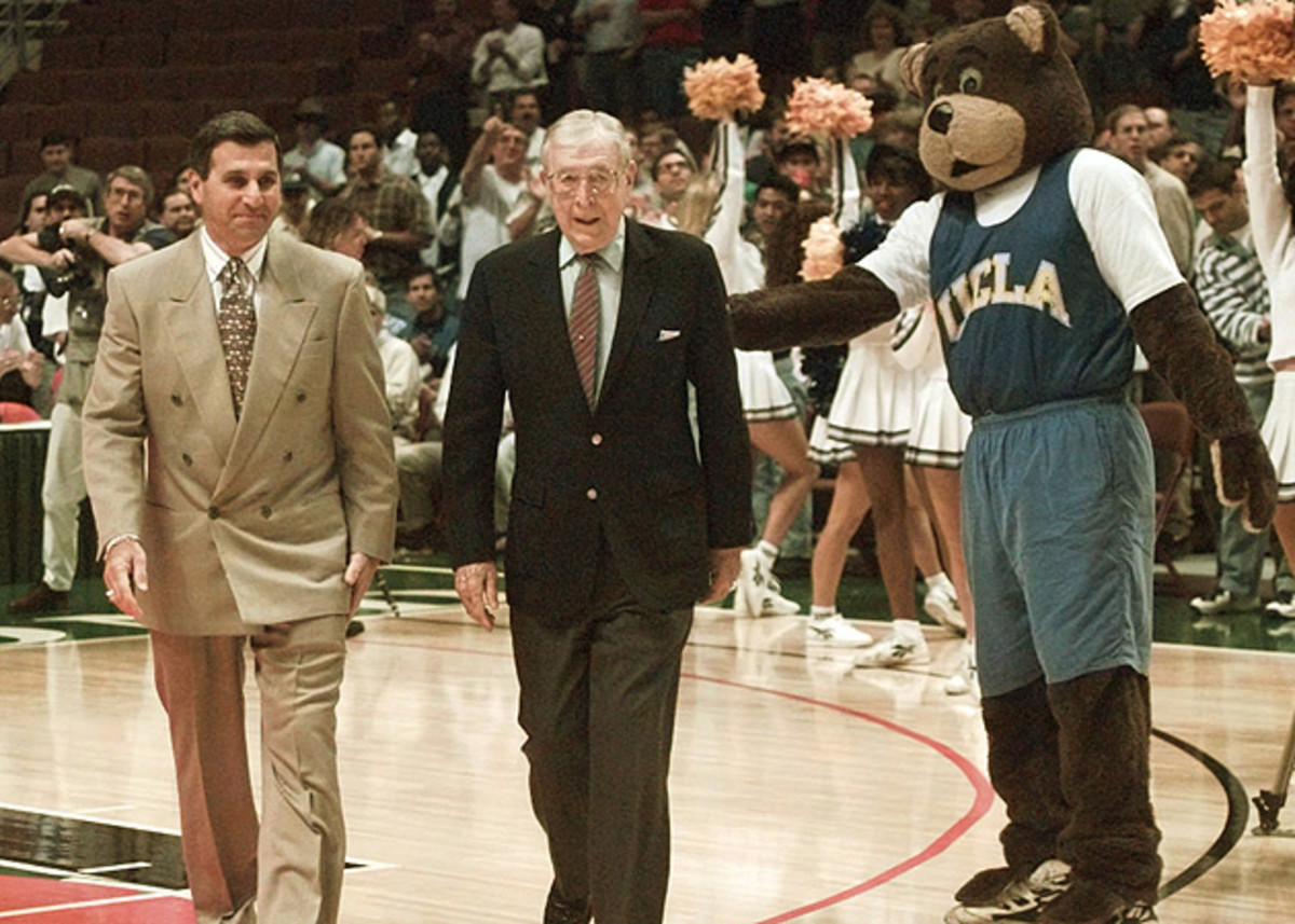 Wooden with then-UCLA coach Jim Harrick in 1995.