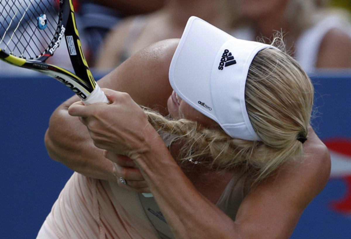 "It was really tangled up good. I think all my hair would have to come off first before that was going anywhere," Wozniacki said after the match. 