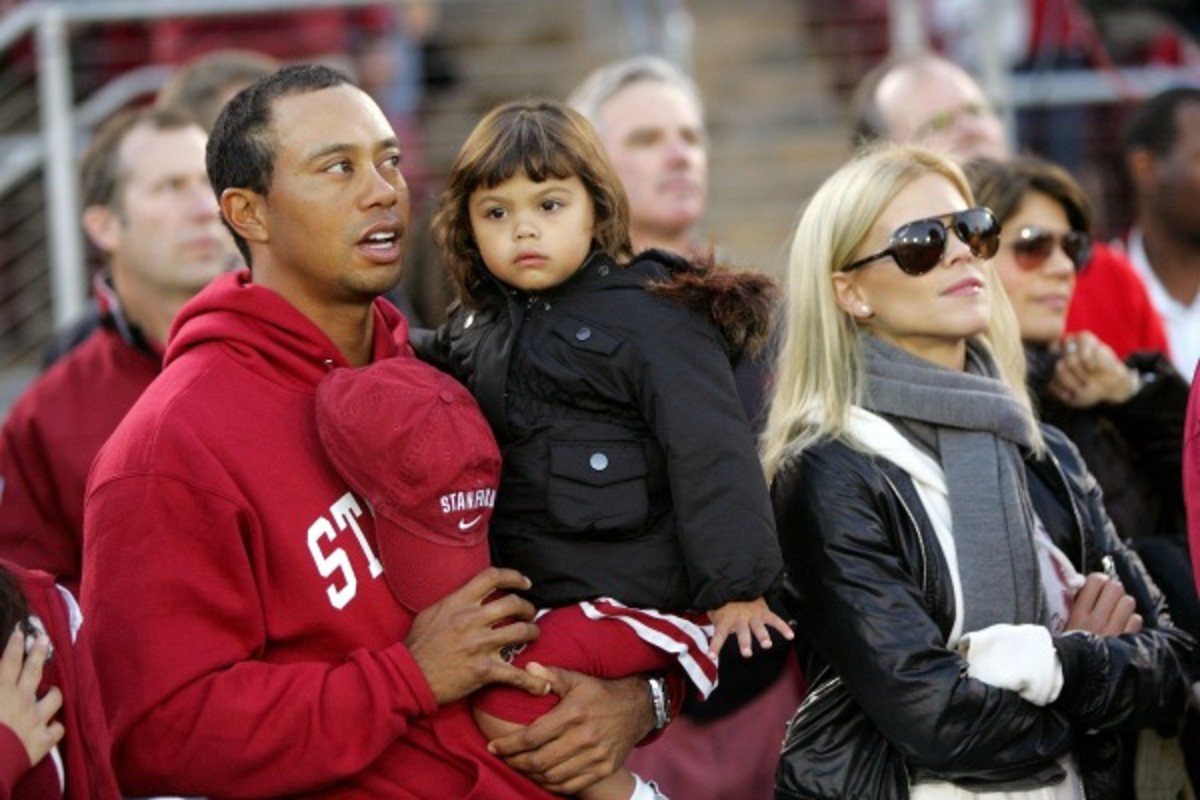 Tiger Woods went with his daughter, Sam, and now ex-wife to a Stanford football game in 2009. (Ezra Shaw/Getty Images)