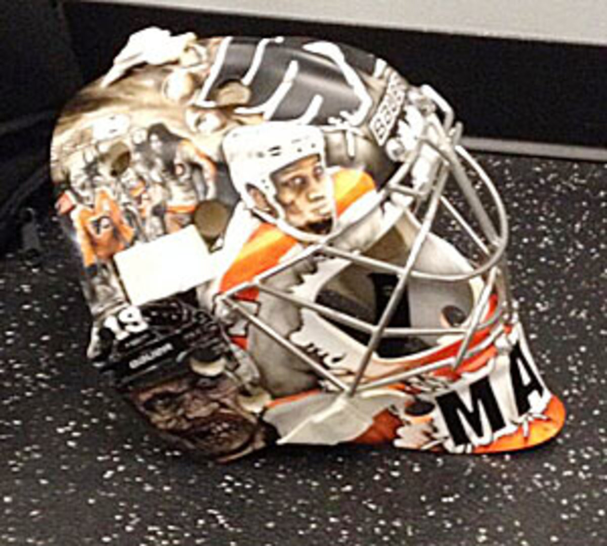 Steve Mason's new goalie mask has Zombie Wayne Simmonds on it.