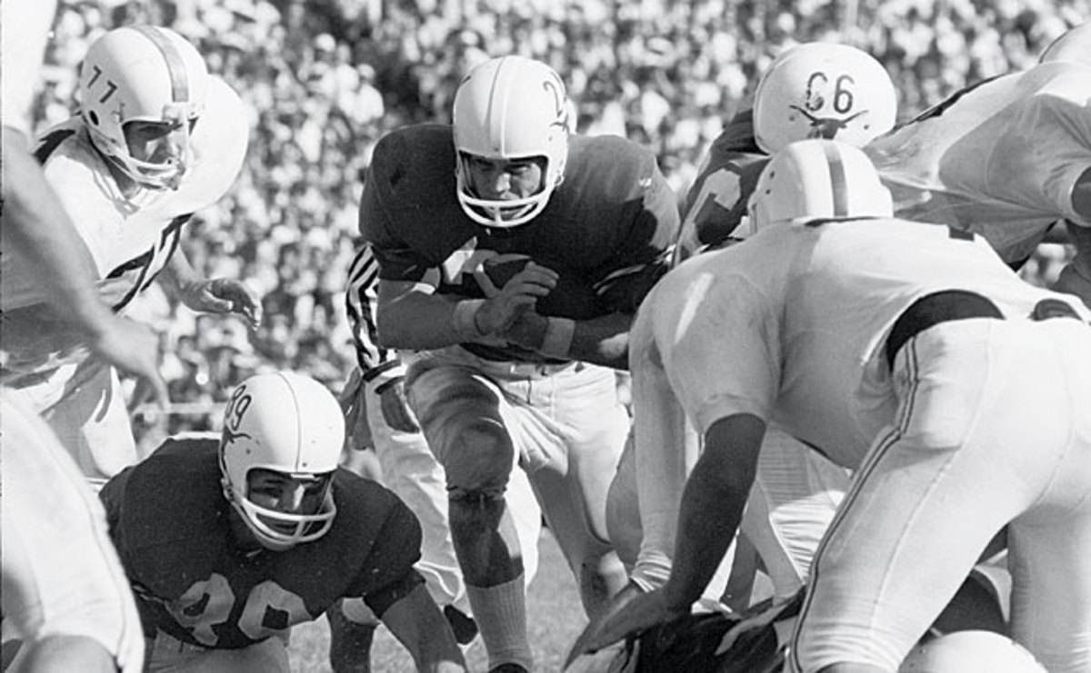 All-America running back Tommy Ford helped No. 2 Texas roll past No. 1 Oklahoma, 28-7.