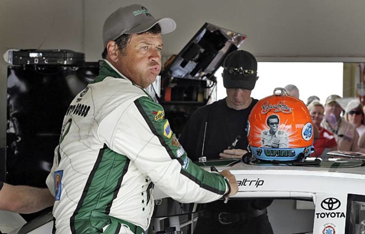 Last year was a tough one for team owner Michael Waltrip, who paid a steep price in a cheating scandal.