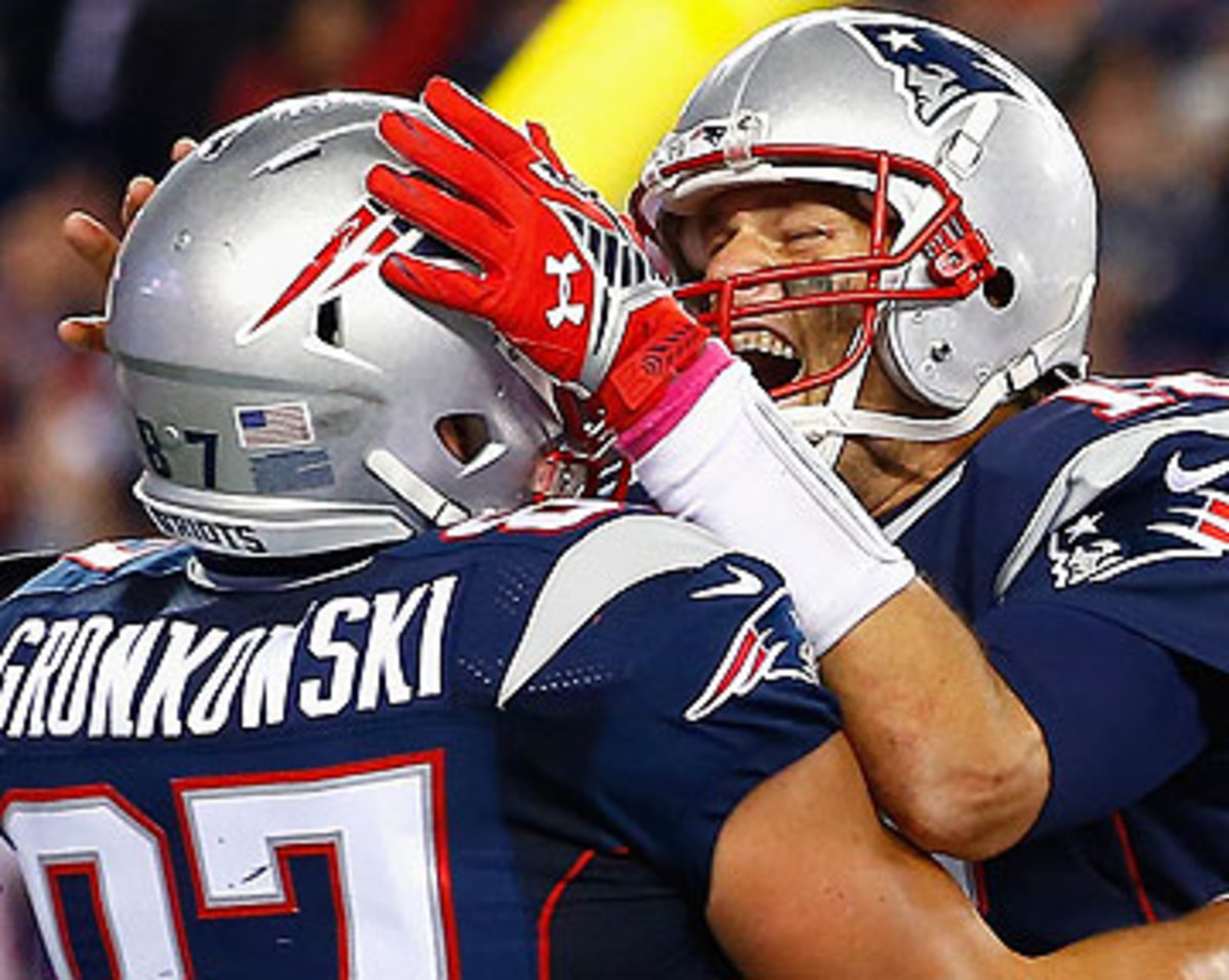 Brady and Rob Gronkowski connected six times for 100 yards and a touchdown. (Jared Wickerham/Getty Images)