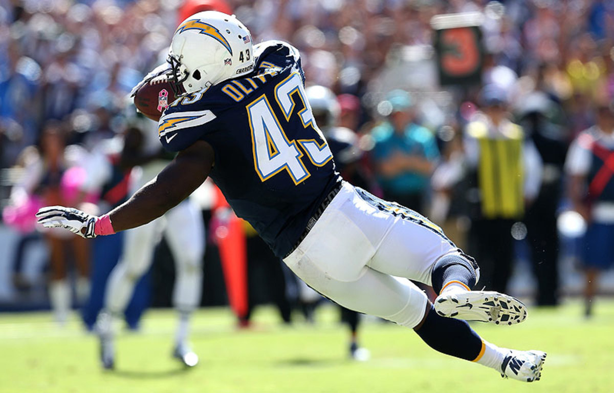 With much of San Diego's backfield banged up, rookie Branden Oliver took advantage of the opportunity and totaled 182 yards and two touchdowns against the Jets. (Stephen Dunn/Getty Images)