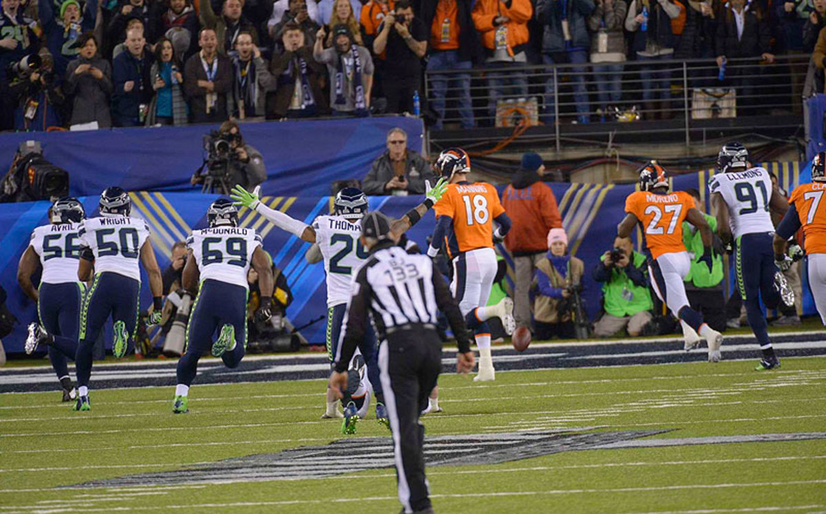 Peyton Manning and the Broncos never recovered from the safety on their first play from scrimmage, which was a result of miscommunication on the snap. (John Iacono/Sports Illustrated/TheMMQB)