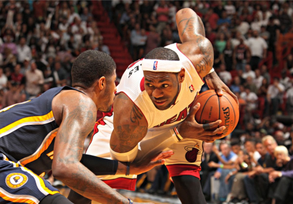 LeBron James got the best of Paul George and the Pacers on Friday. (Issac Baldizon/NBAE via Getty Images)