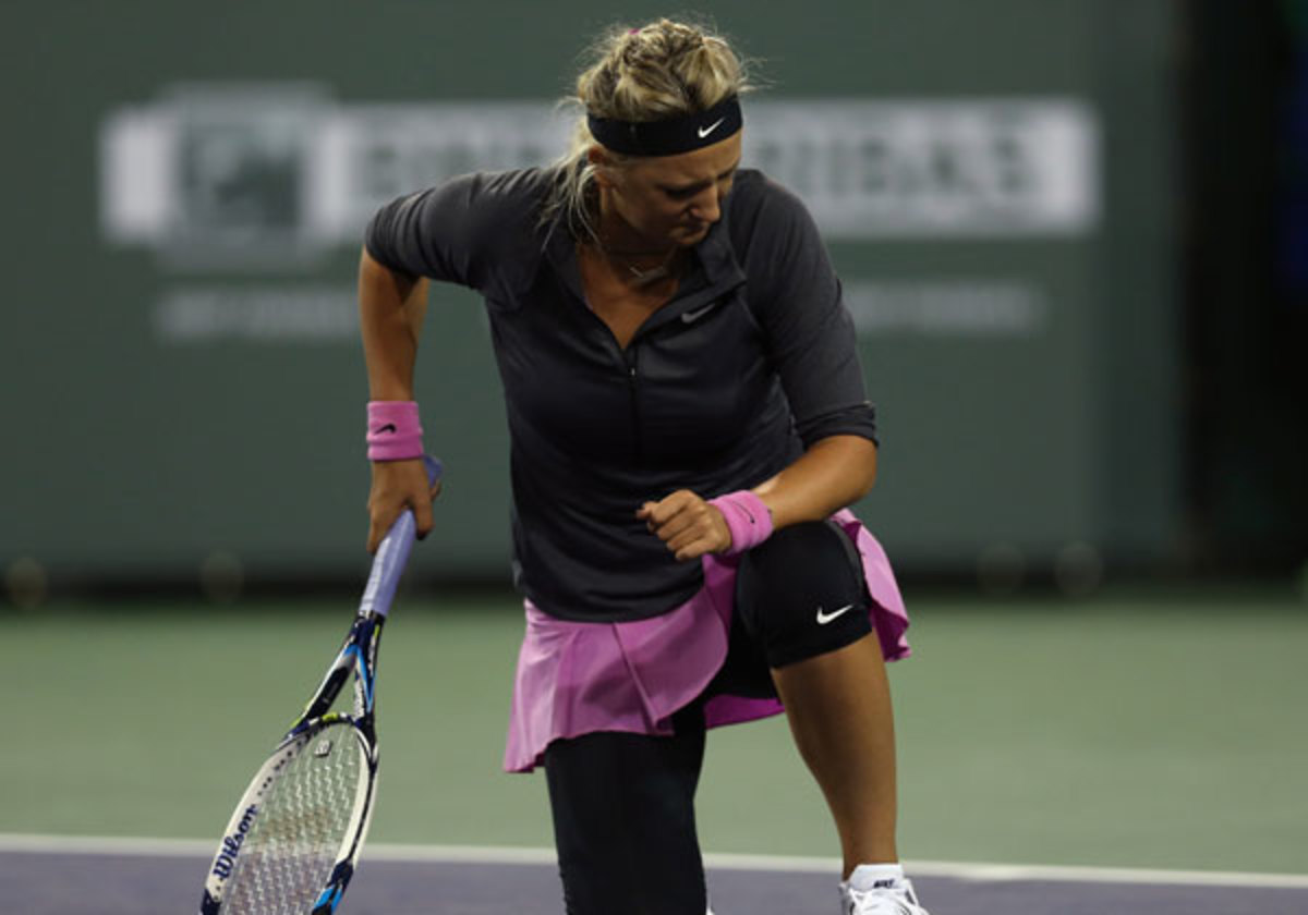Victoria Azarenka was clearly in pain throughout the match. (Jeff Gross/Getty Images)