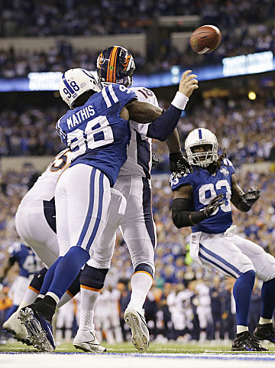 Peyton Manning won't miss his ex-teammate in the season opener. Last October in Indianapolis Mathis sacked Manning twice, including this strip sack that led to a safety, in a Colts victory. (AJ Mast/AP)