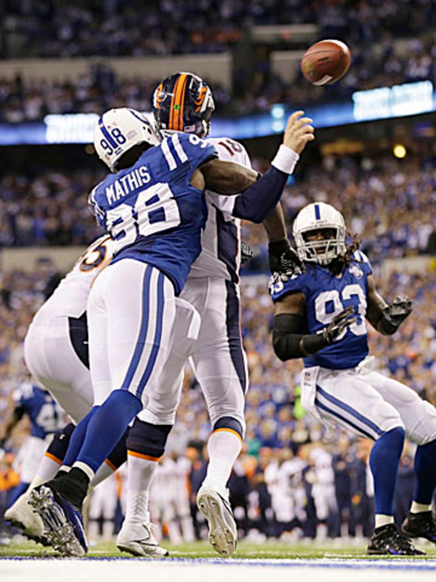 Peyton Manning won't miss his ex-teammate in the season opener. Last October in Indianapolis Mathis sacked Manning twice, including this strip sack that led to a safety, in a Colts victory. (AJ Mast/AP)