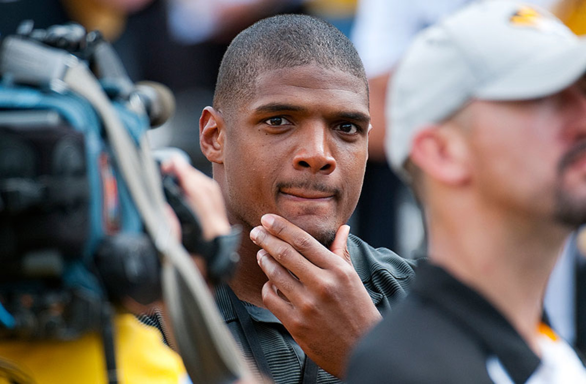 Michael Sam attended the South Dakota State-Missouri game on Saturday, the day he found out he didn't make the Rams' 53-man roster. (L.G. Patterson/AP)