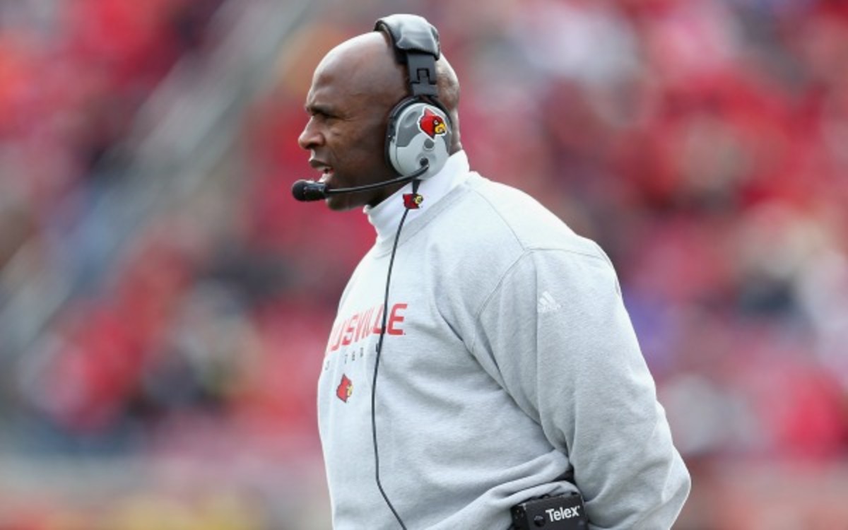Louisville's Charlie Strong will replace Mack Brown as the Longhorns head coach. (Andy Lyons/Getty Images)