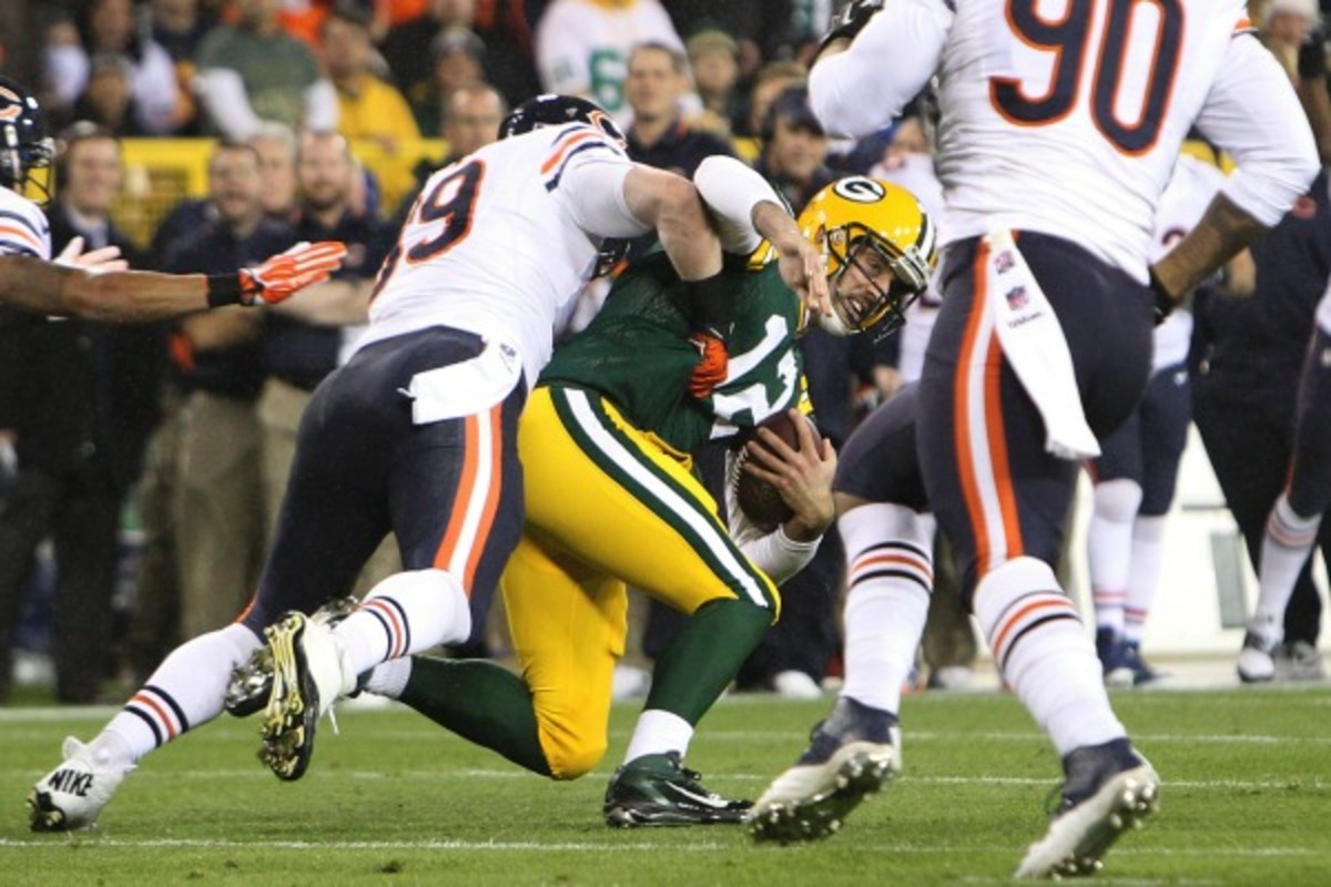 Aaron Rodgers suffered a shoulder injury against the Bears Monday night. (Mike McGinnis/Getty Images)
