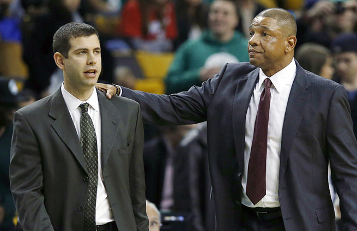 Doc Rivers (right) returned to Boston for the first time, meeting his Celtics successor, Brad Stevens. 