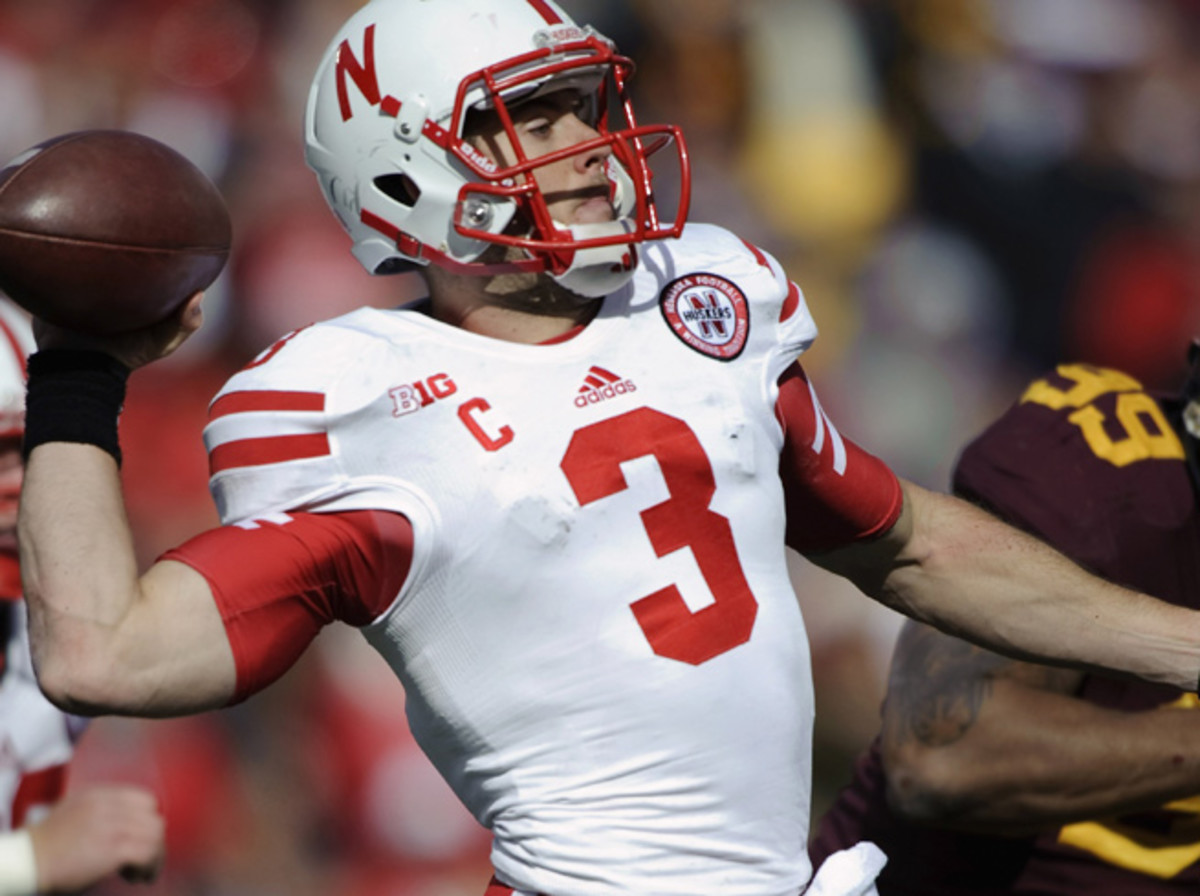 Nebraska QB Taylor Martinez says his foot is still ailing Sports