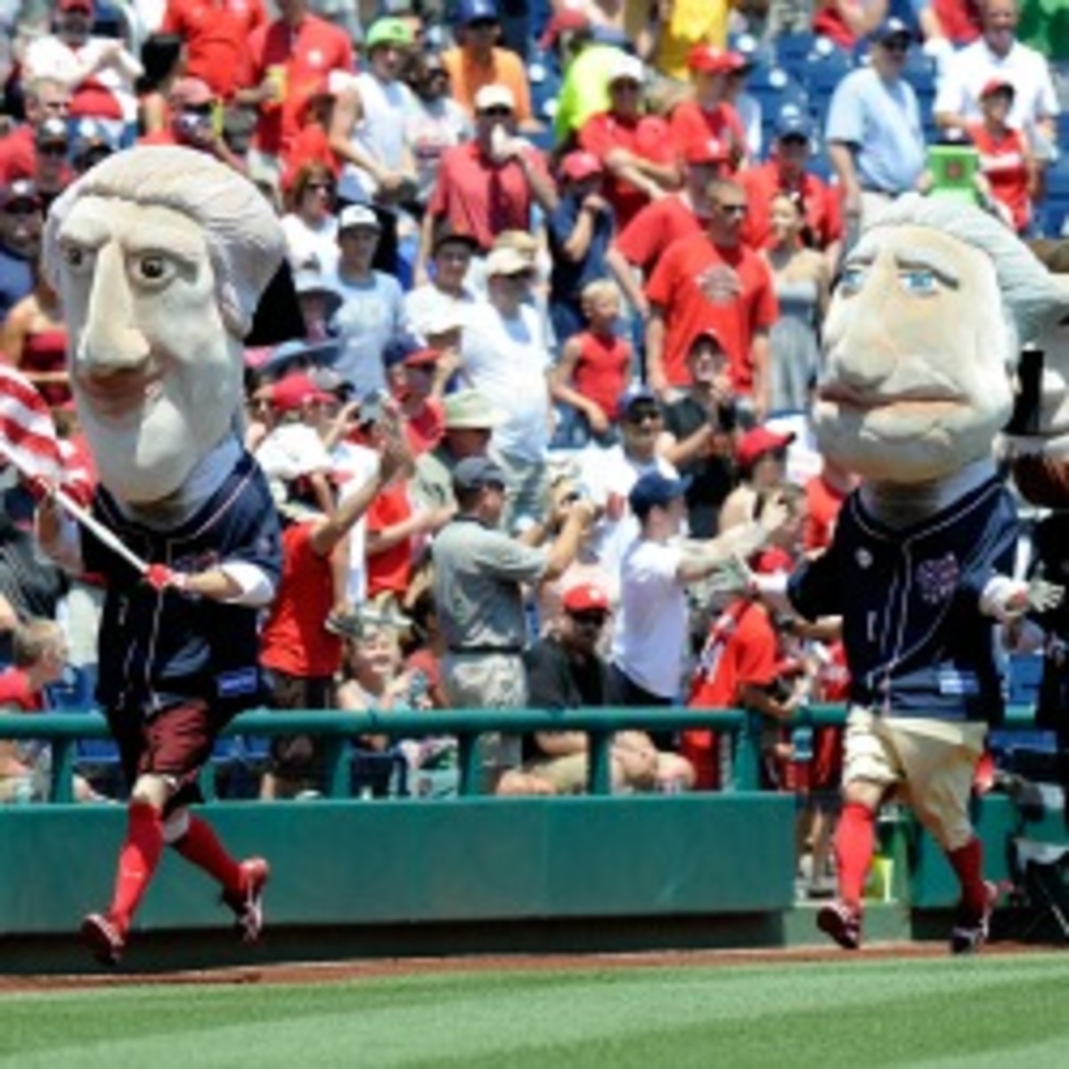 The Nationals' presidents' race occurs in the middle of the fourth inning of every home game. (Greg Fiume/Getty Images)